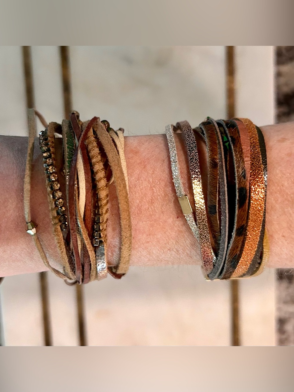 Set of Multi-Strand Leather Wrap Bracelets in Brown and Metallics
